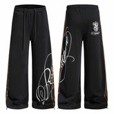 CapCabin “Signature Side Stripe Sweatpants”