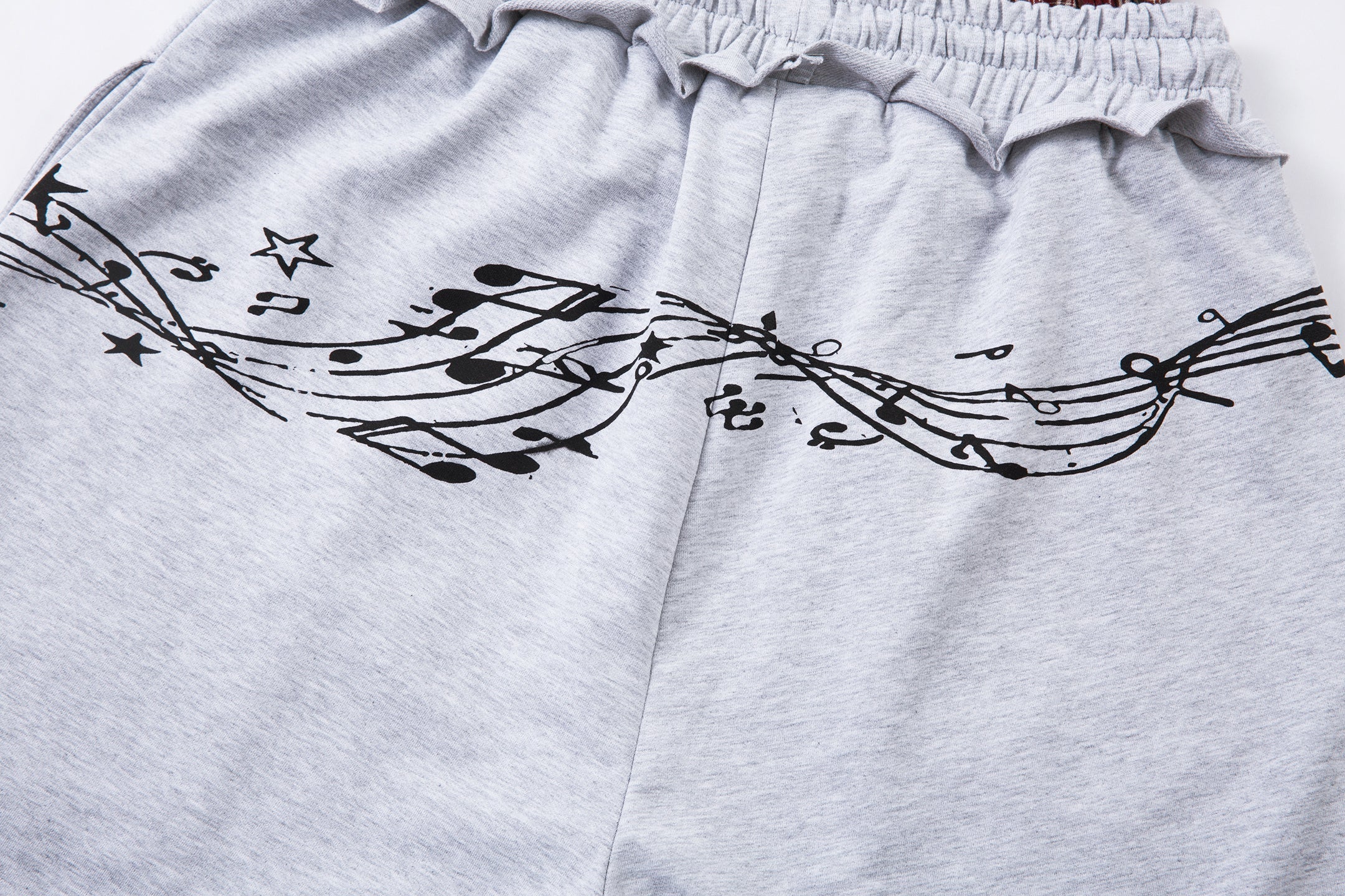 CapCabin Music Graphic Wide-Leg Sweatpants