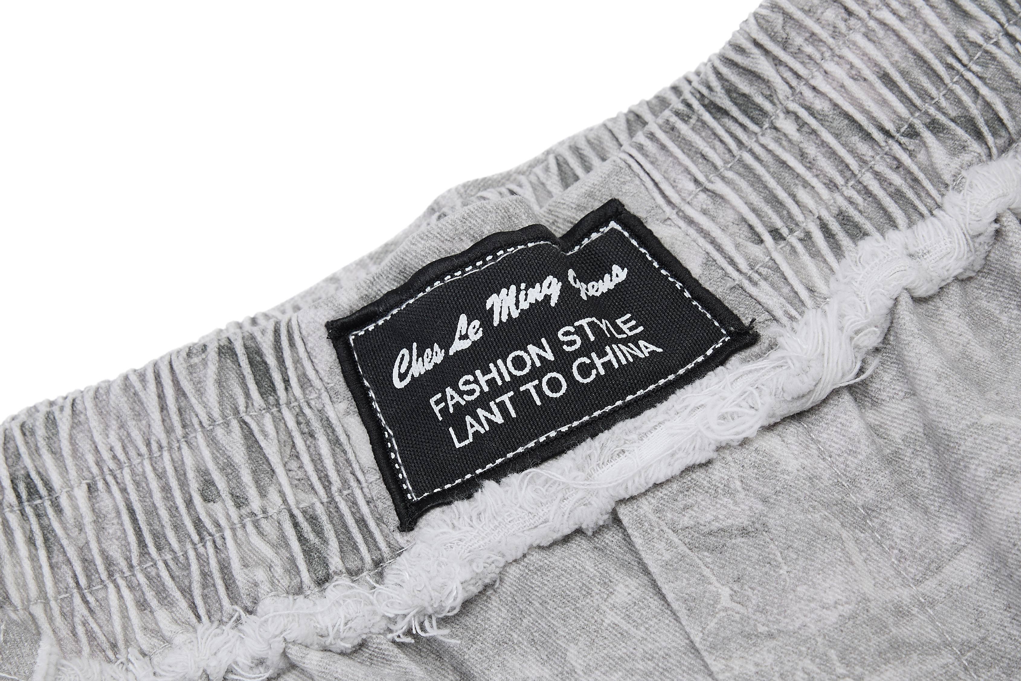 CapCabin “Washed Marble Wide-Leg Pants”