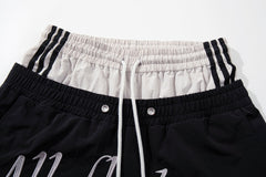 CapCabin Script Graphic Wide-Leg Track Pants