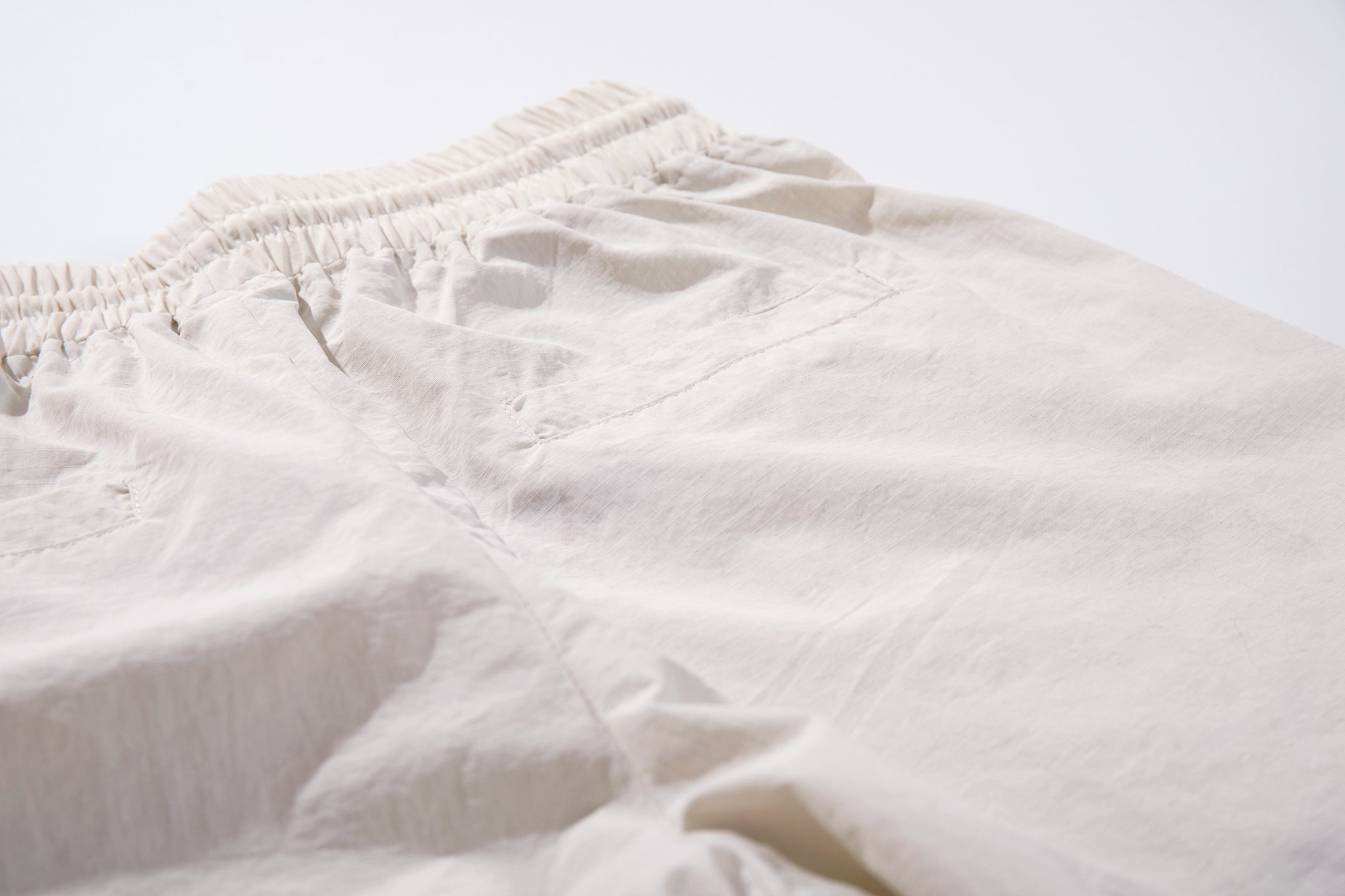 CapCabin Cross Graphic Wide-Leg Track Pants