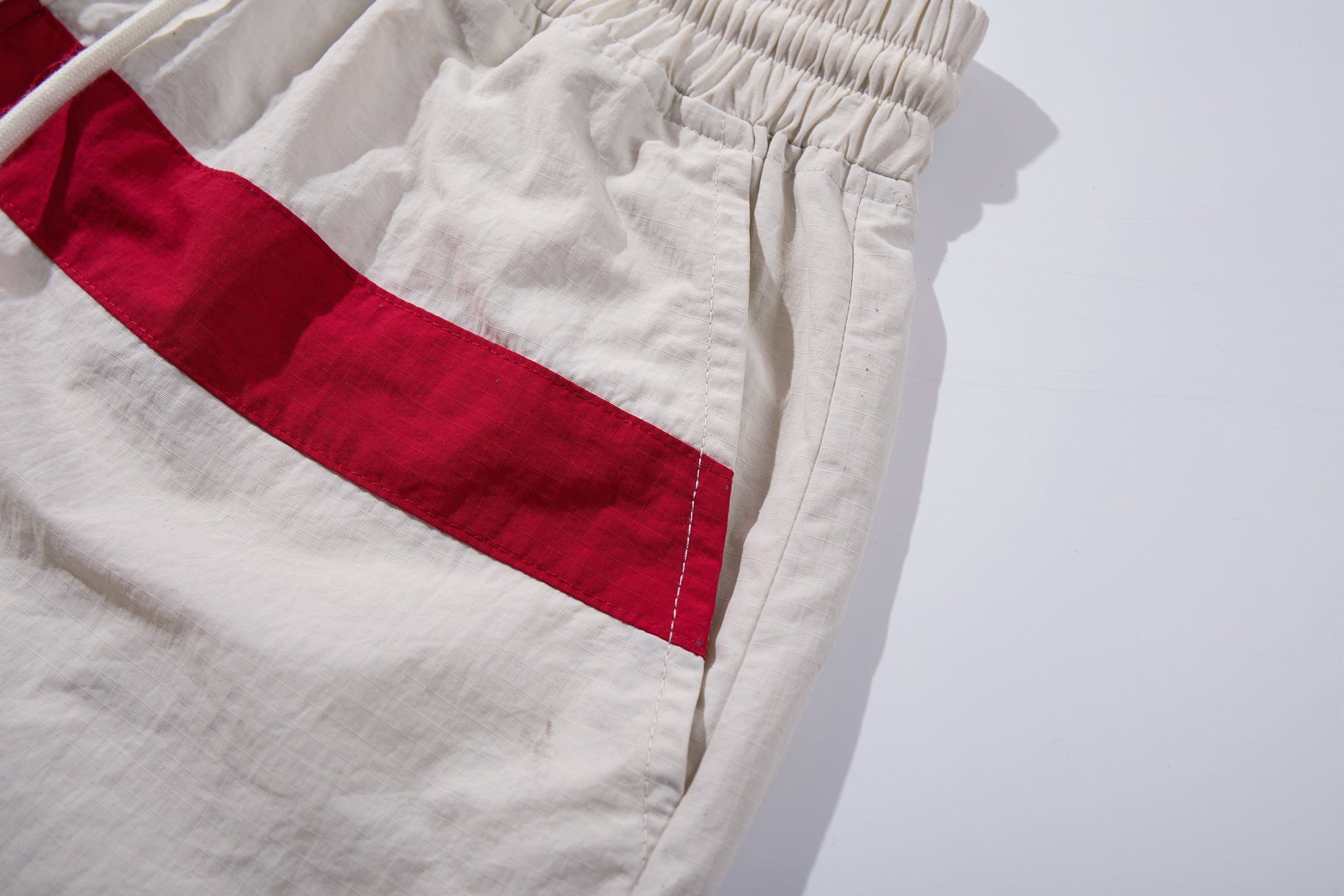 CapCabin Cross Graphic Wide-Leg Track Pants