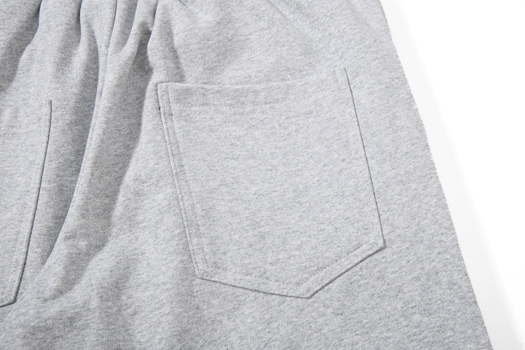 CapCabin “Varsity Crest Wide-Leg Sweatpants”