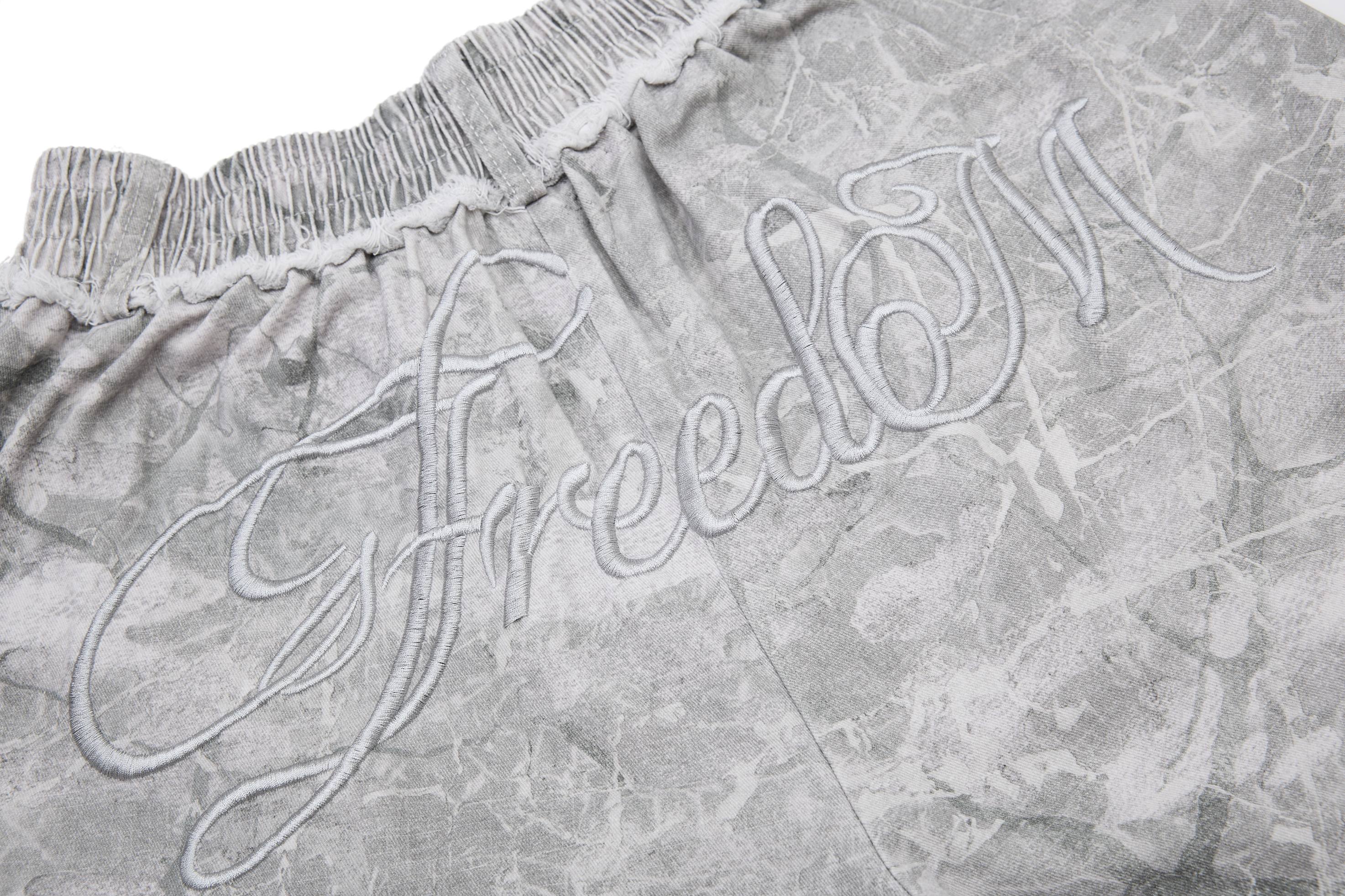 CapCabin “Washed Marble Wide-Leg Pants”