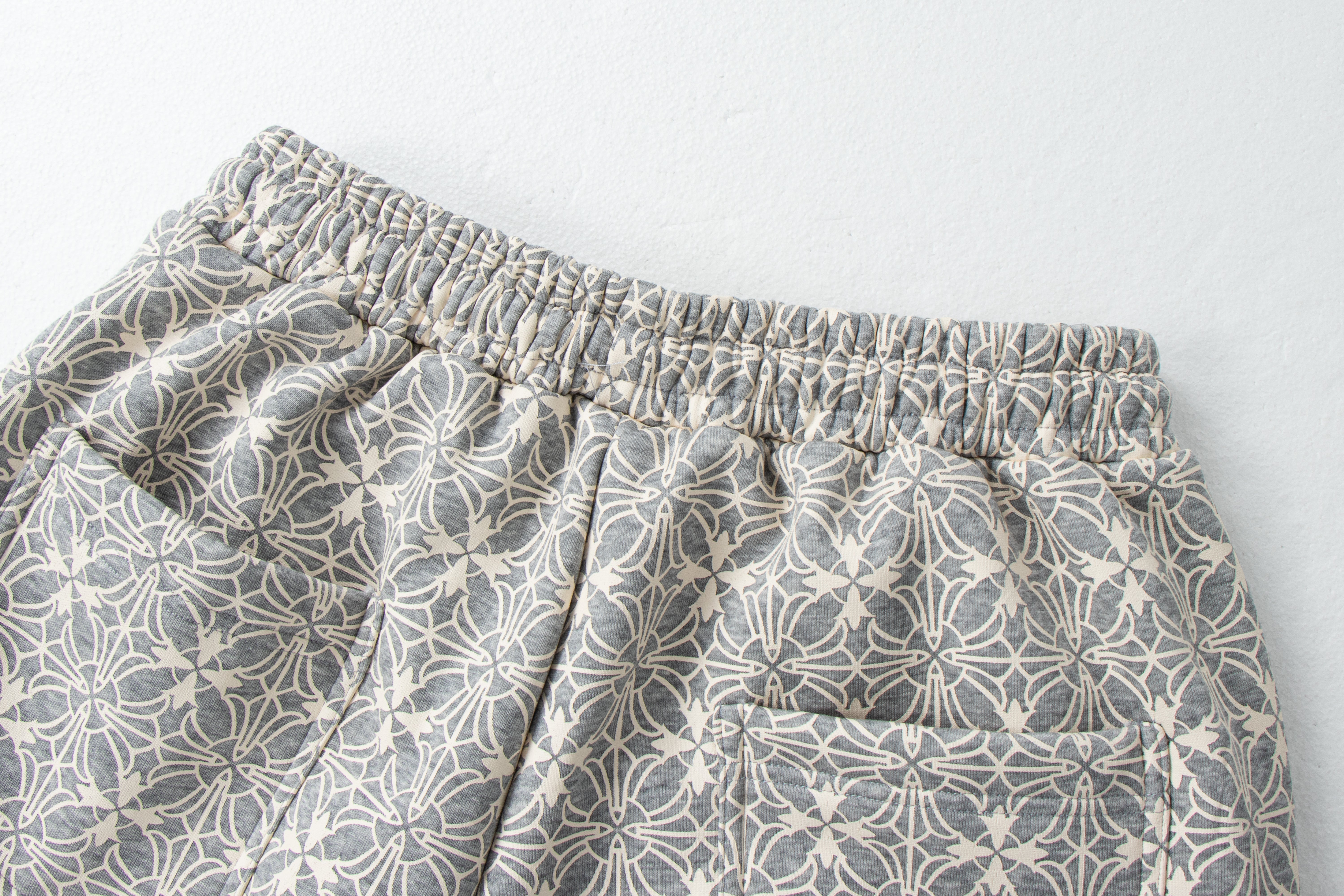 CapCabin All-Over Pattern Graphic Wide-Leg Pants
