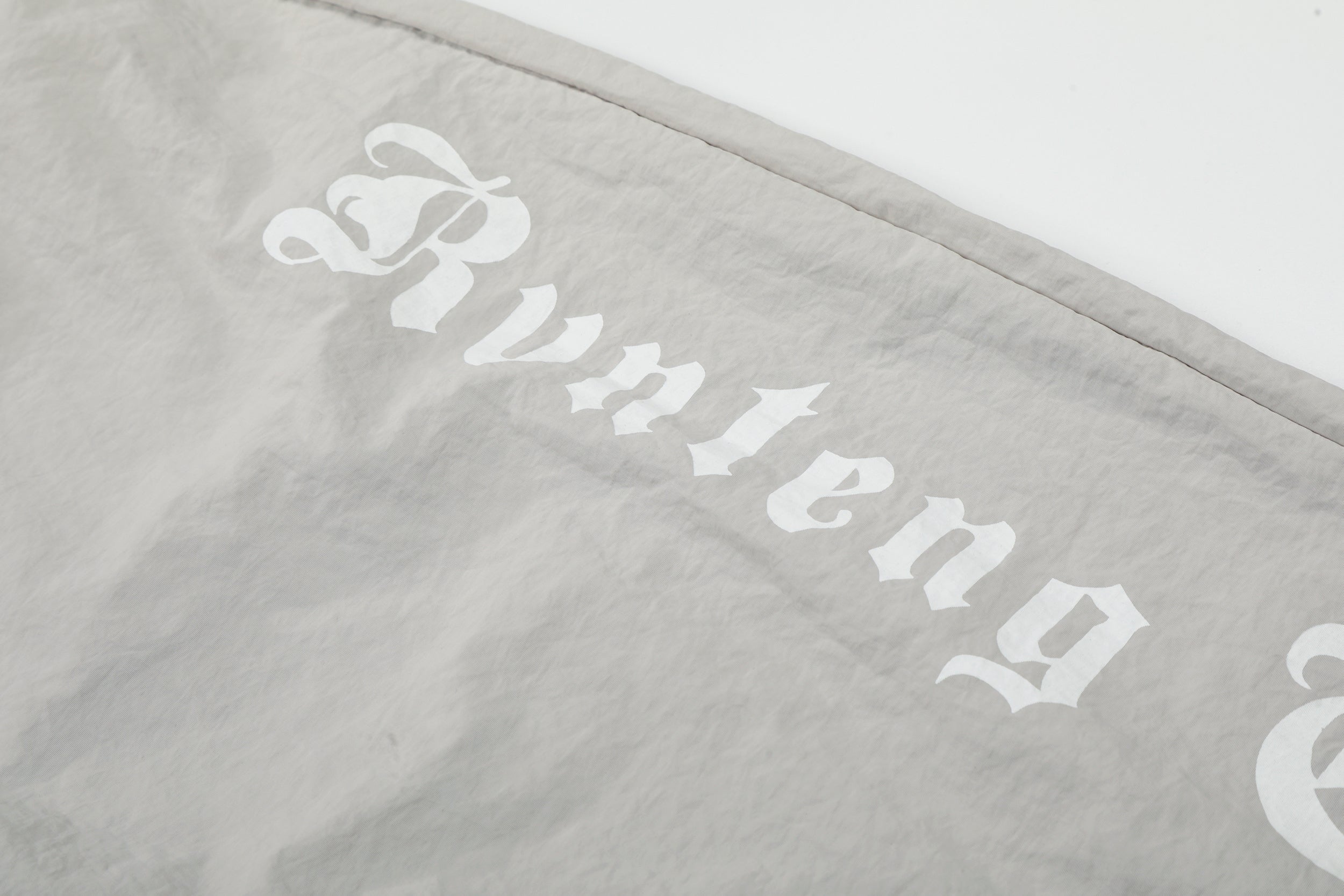 CapCabin Script Logo Wide-Leg Nylon Pants