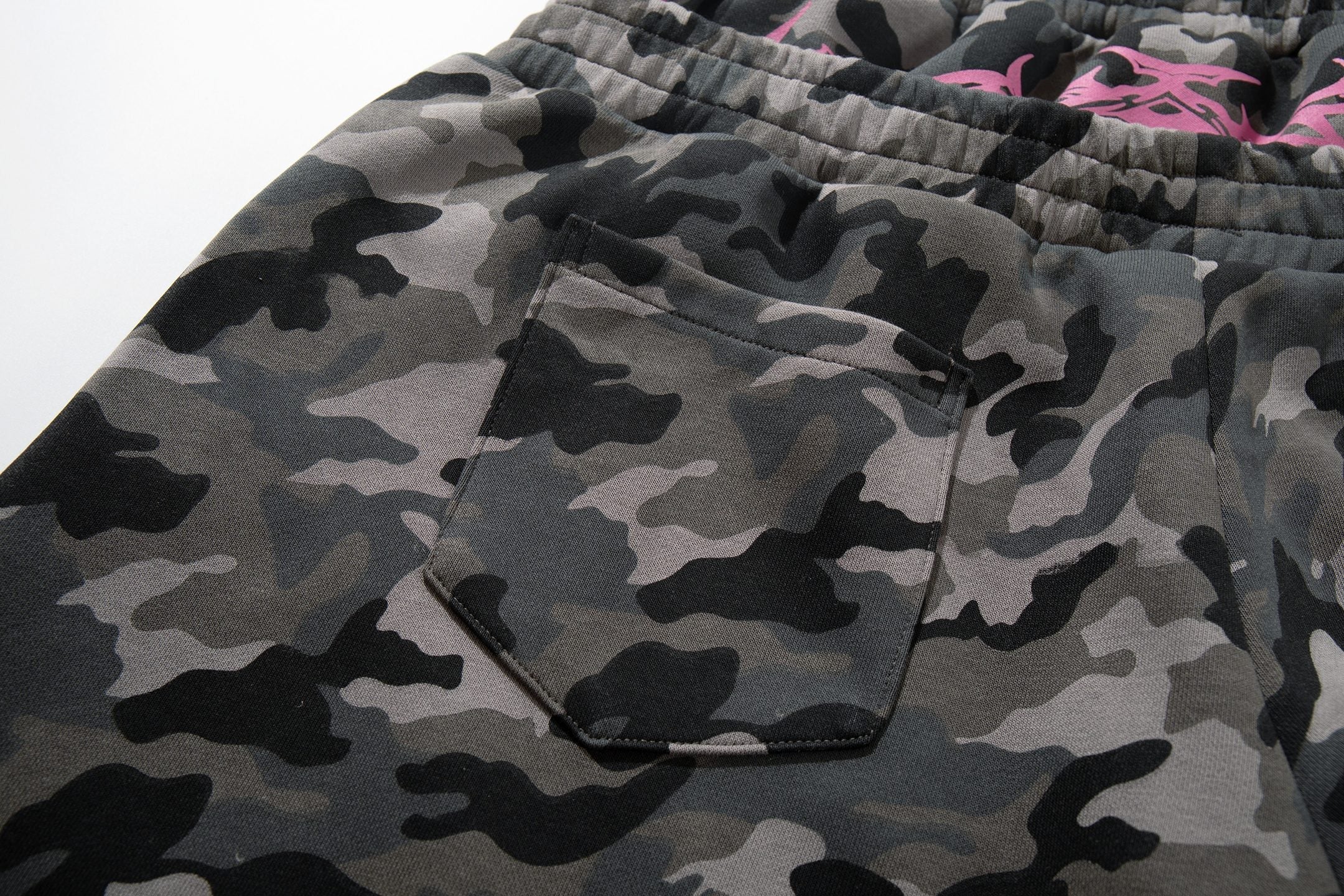 CapCabin “Camo Graffiti Wide-Leg Pants”